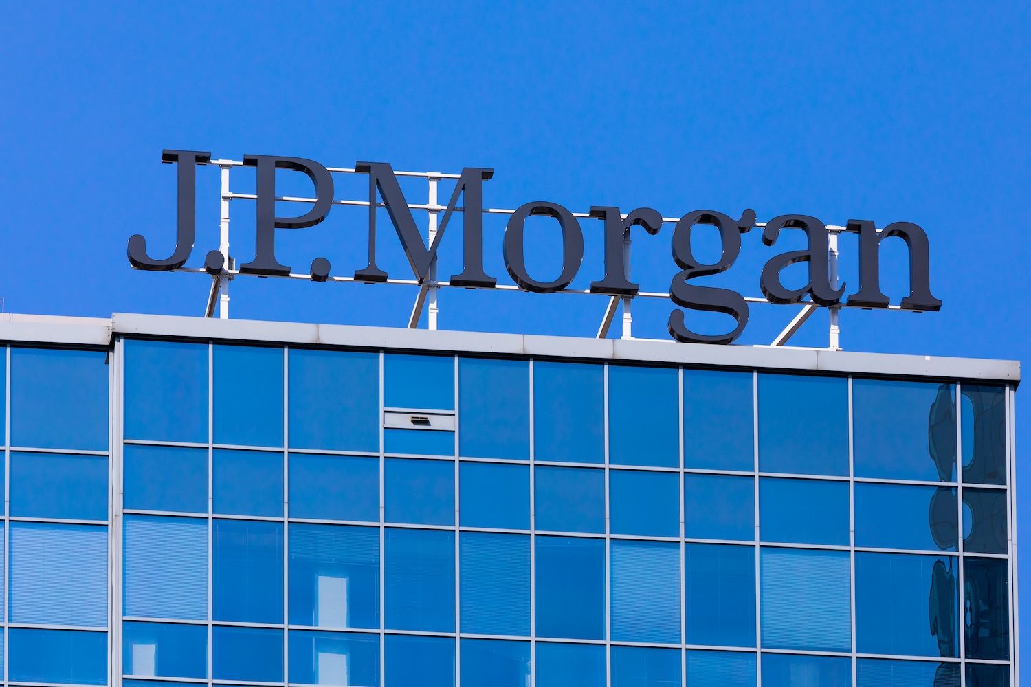 J.P. Morgan is one of the pioneers of blockchain adoption, Konektus Photo/Shutterstock